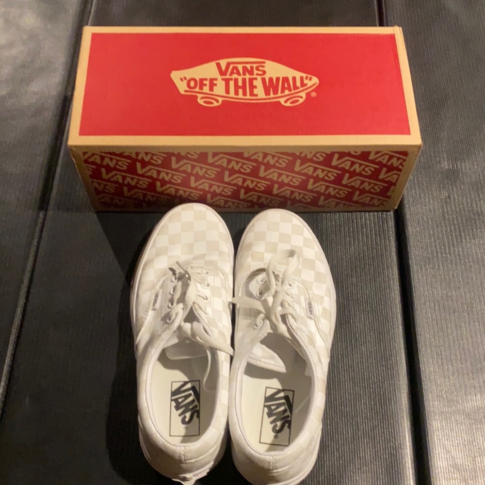 Unisex white checkered vans. They come with the box.